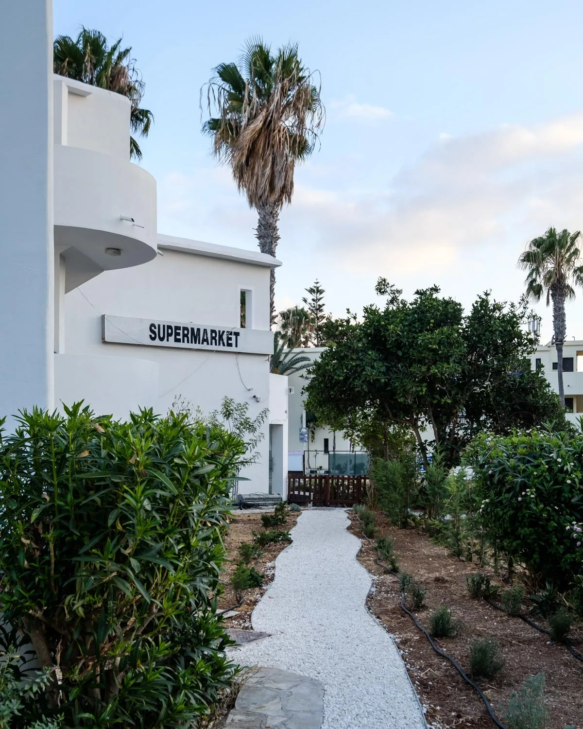 Garden path to the supermarket on site